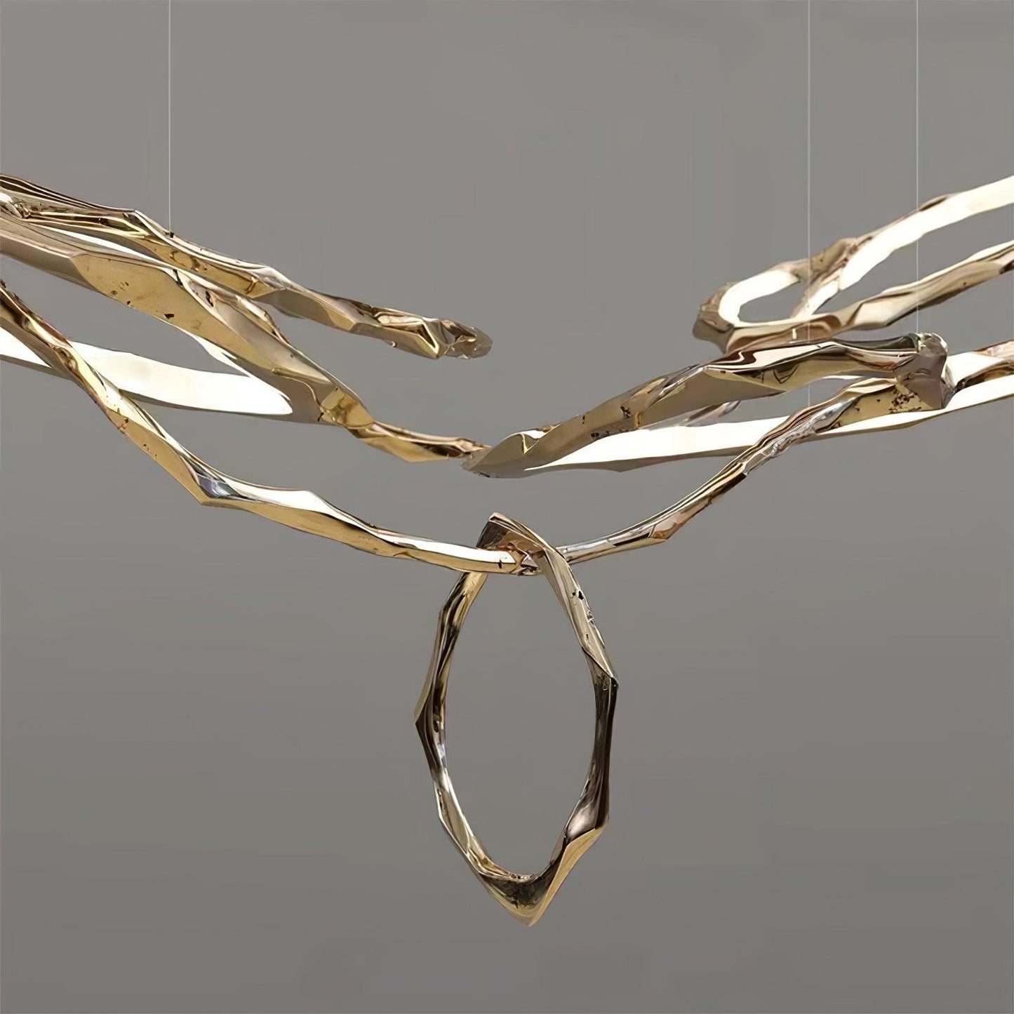 Elegant Brass Chandelier with Adjustable Arms and Ambient Lighting