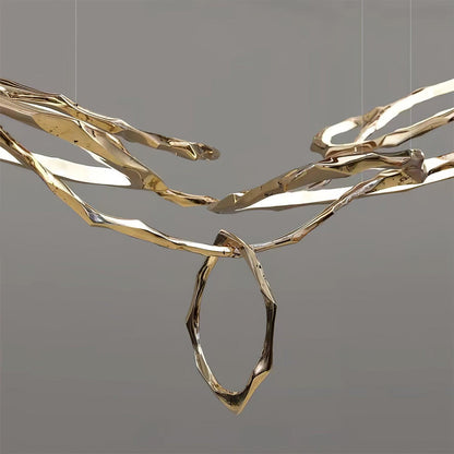 Elegant Brass Chandelier with Adjustable Arms and Ambient Lighting