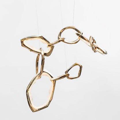 Elegant Brass Chandelier with Adjustable Arms and Ambient Lighting