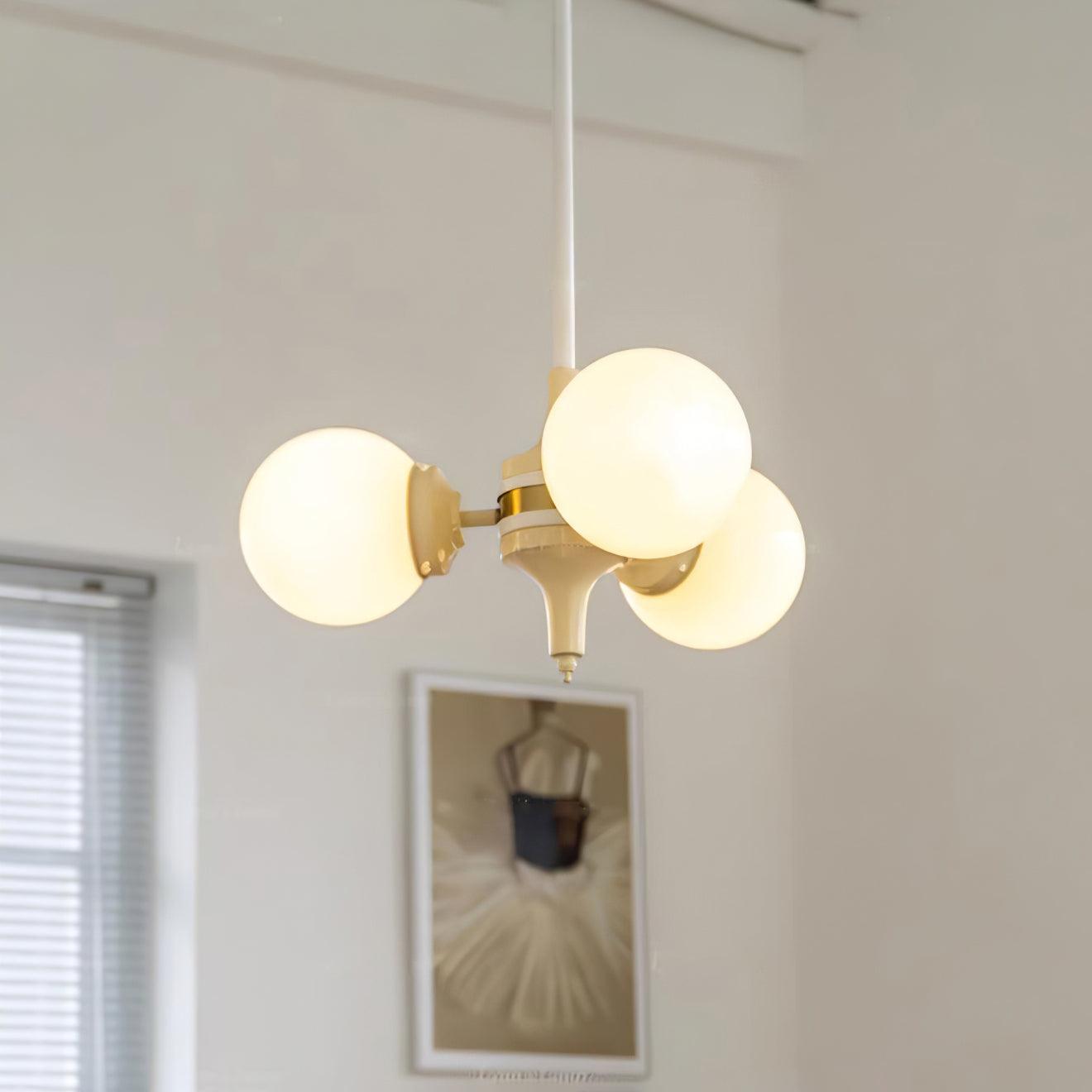 Elegant Cream Glass Ball Chandelier with Adjustable Height & Soft Glow