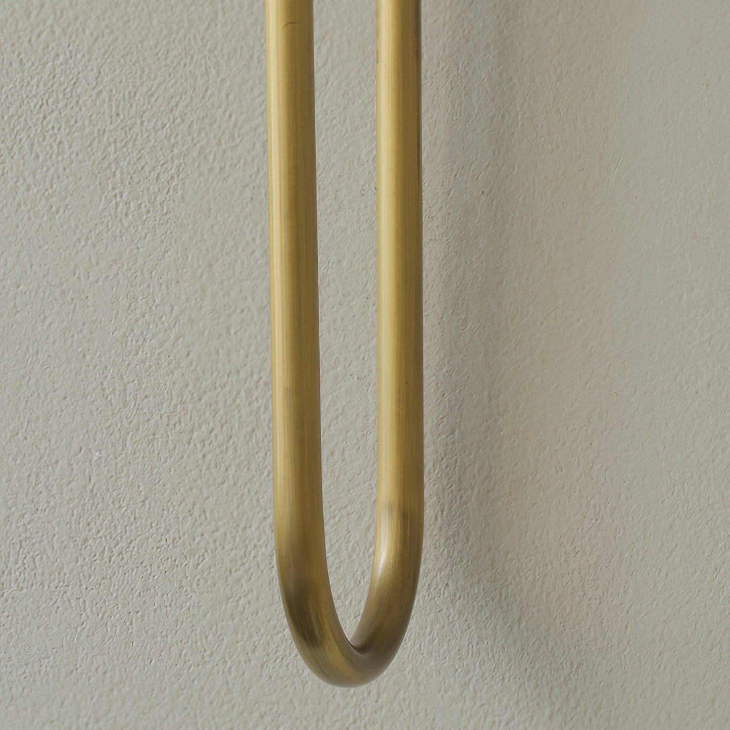 Double Arrow Wall Sconce - Adjustable Lighting & Modern Design