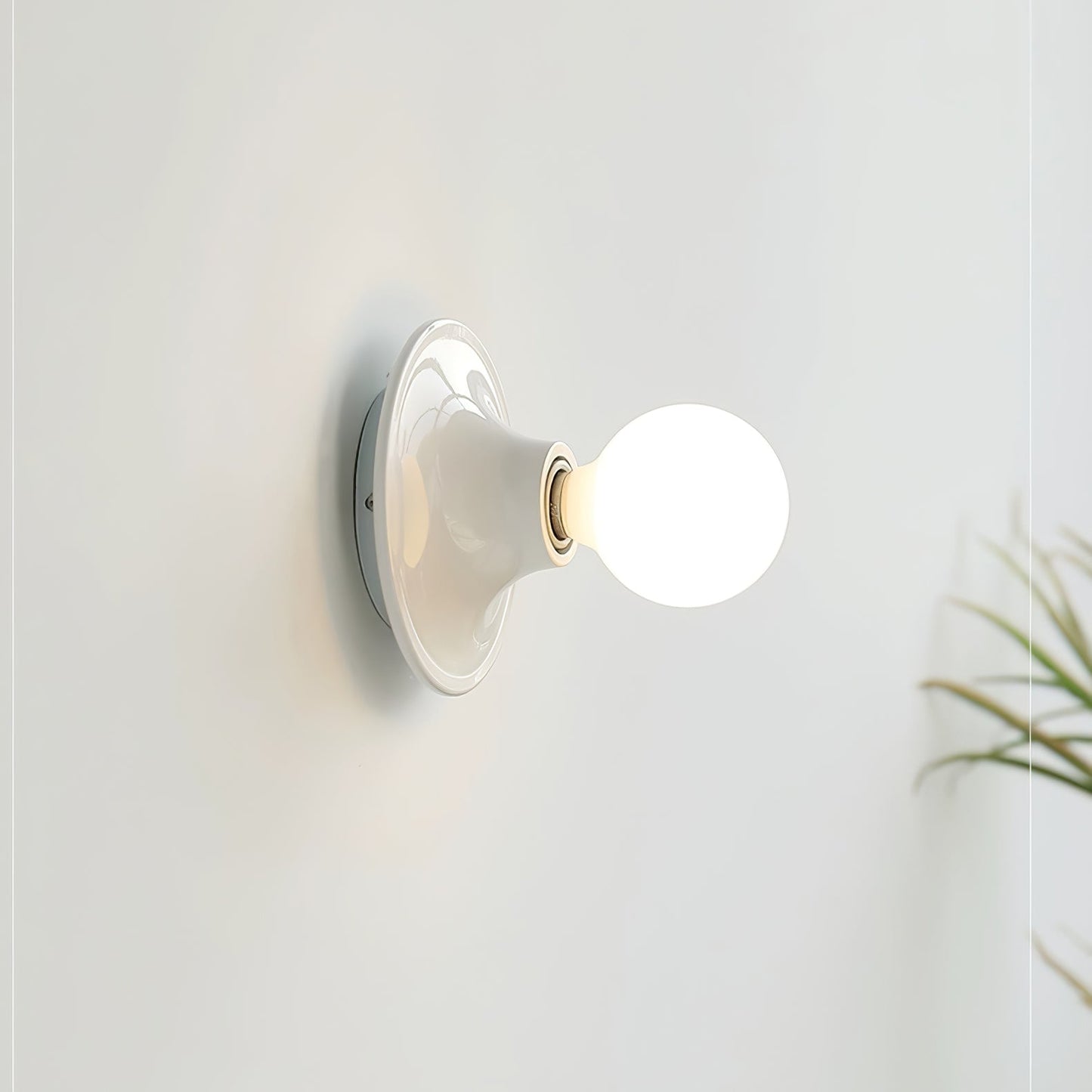 Eclipta Wall Sconce - Adjustable Lighting & Modern Design