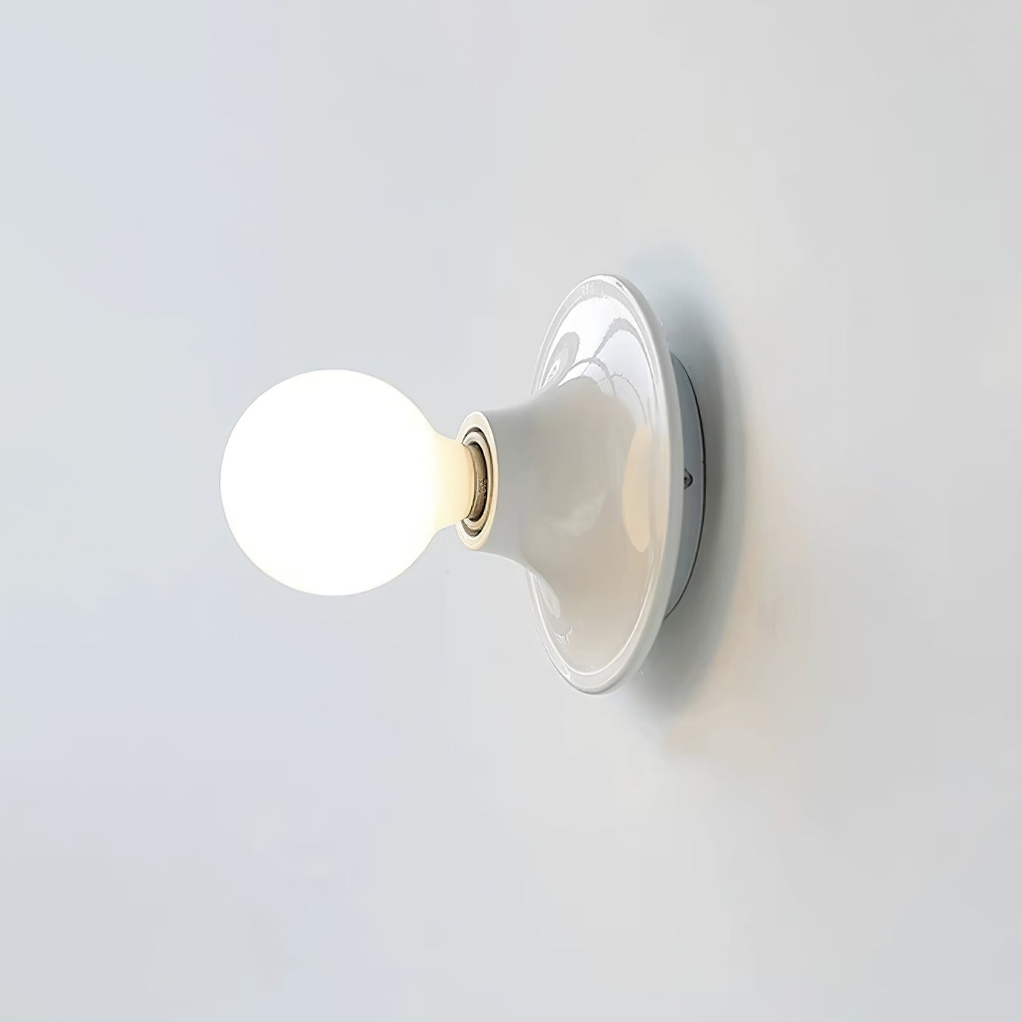Eclipta Wall Sconce - Adjustable Lighting & Modern Design
