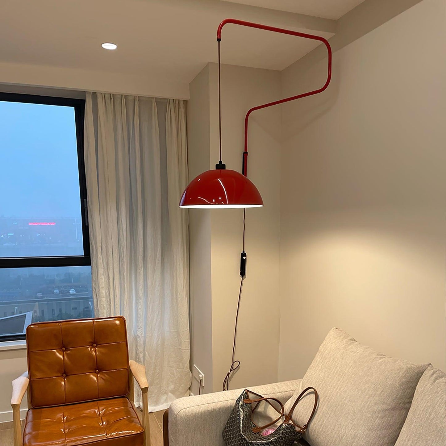 Elio Plug-In Wall Lamp with Adjustable Brightness and Modern Design