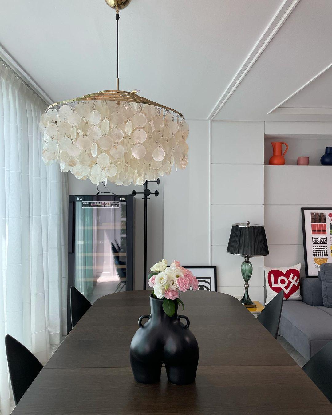 Elegant Round Shell Chandelier with Adjustable Height & Soft Lighting
