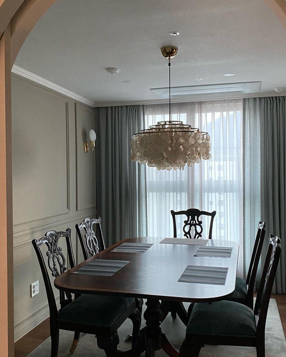 Elegant Round Shell Chandelier with Adjustable Height & Soft Lighting