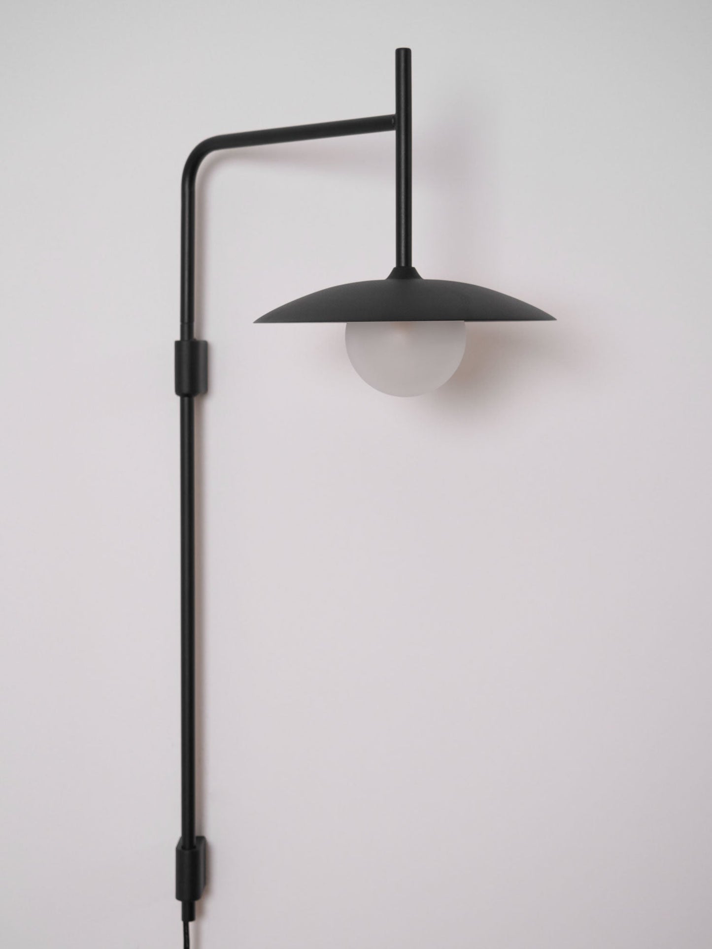 Gea Swing Arm Wall Lamp - Adjustable Light & Plug-in Design