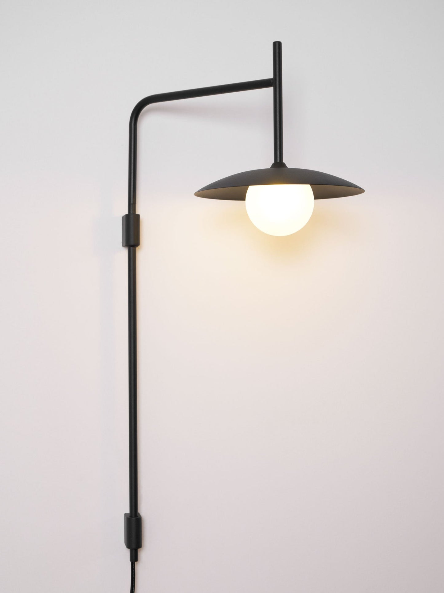 Gea Swing Arm Wall Lamp - Adjustable Light & Plug-in Design
