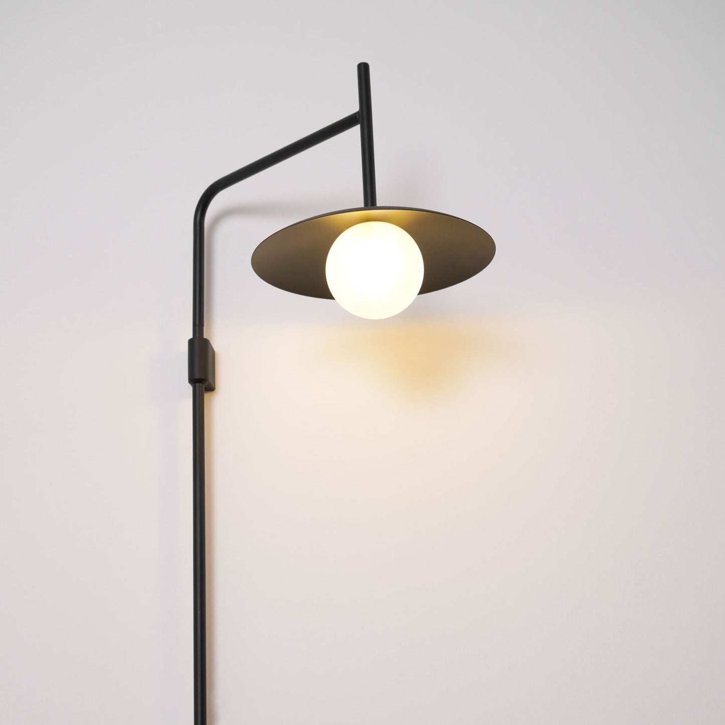 Gea Swing Arm Wall Lamp - Adjustable Light & Plug-in Design