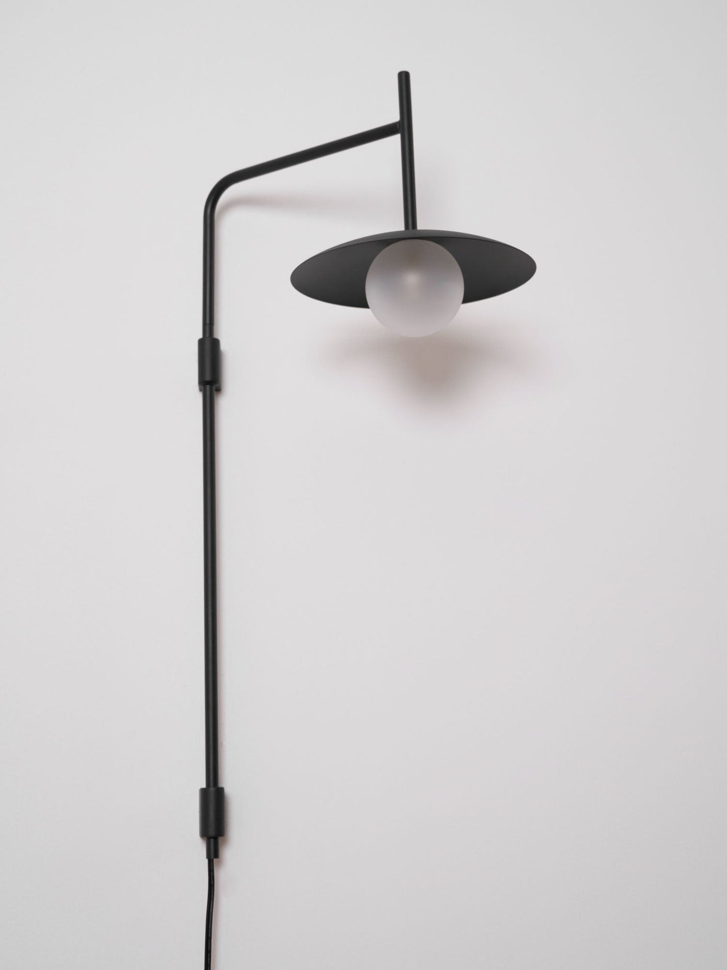 Gea Swing Arm Wall Lamp - Adjustable Light & Plug-in Design
