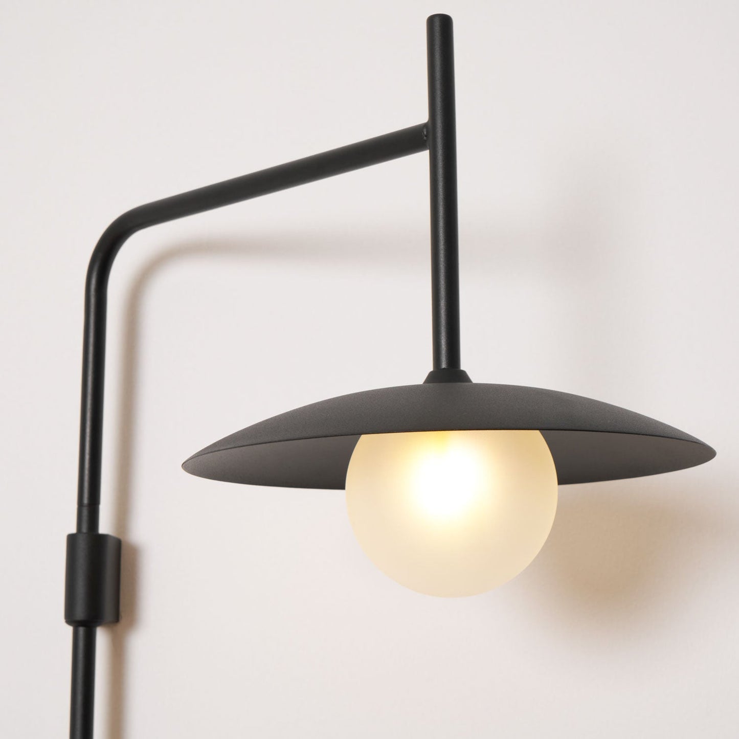 Gea Swing Arm Wall Lamp - Adjustable Light & Plug-in Design