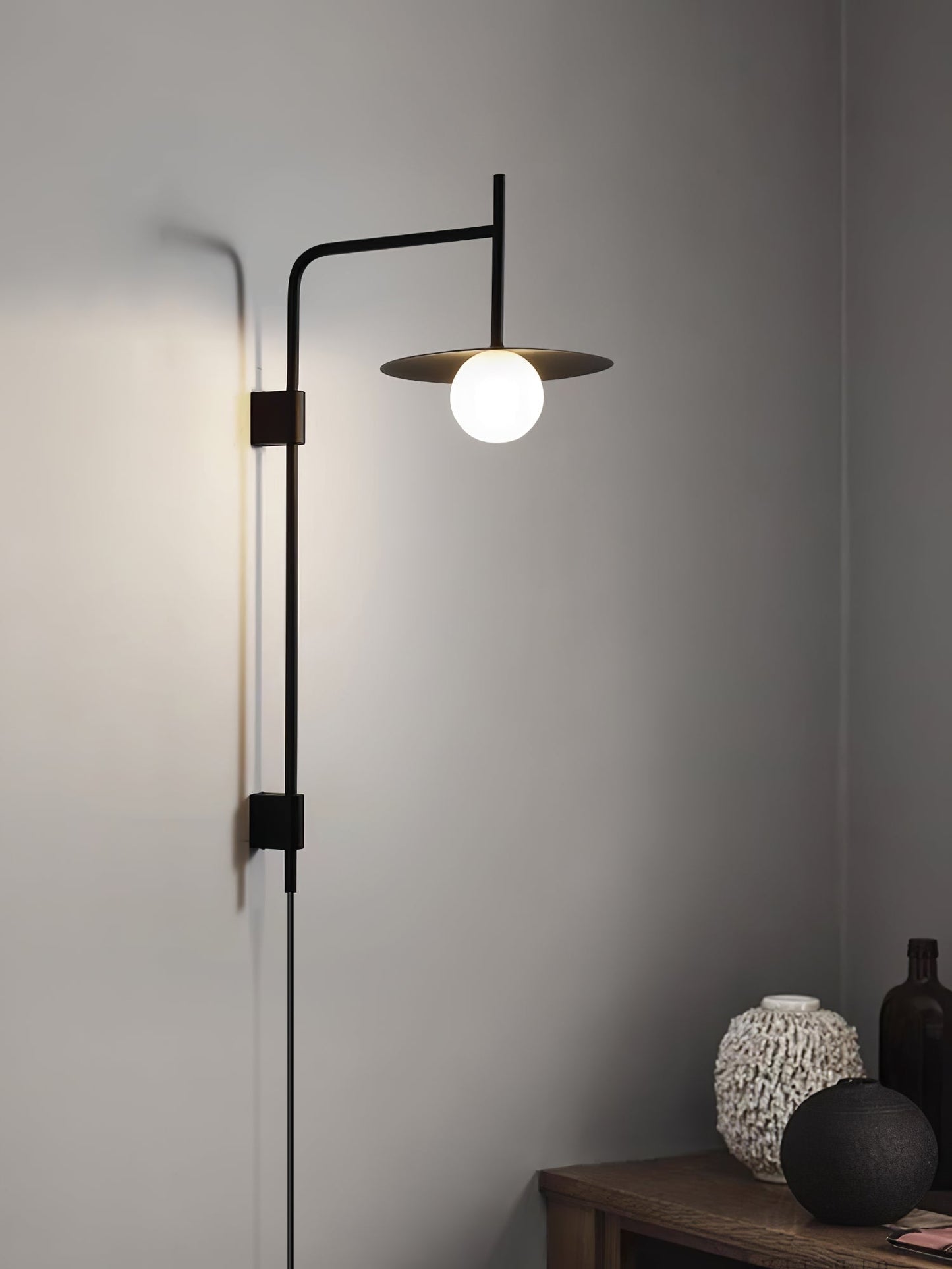 Gea Swing Arm Wall Lamp - Adjustable Light & Plug-in Design