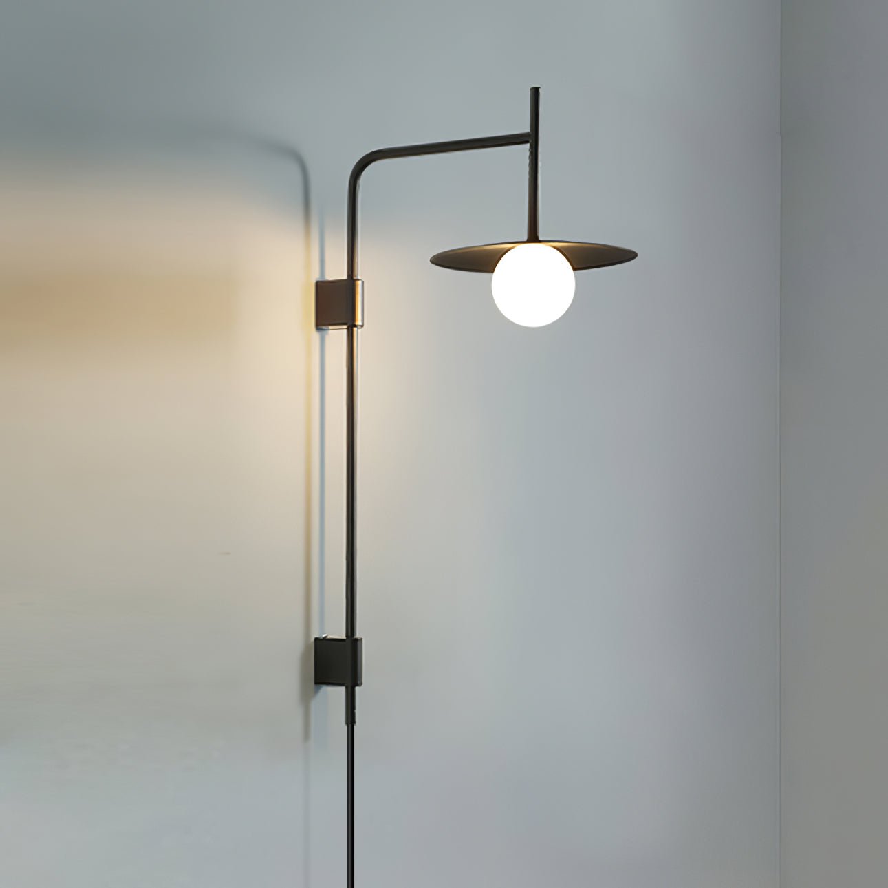 Gea Swing Arm Wall Lamp - Adjustable Light & Plug-in Design