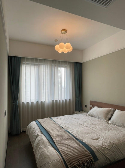 Elegant Glass Cluster Chandelier with Adjustable Height & Modern Desig