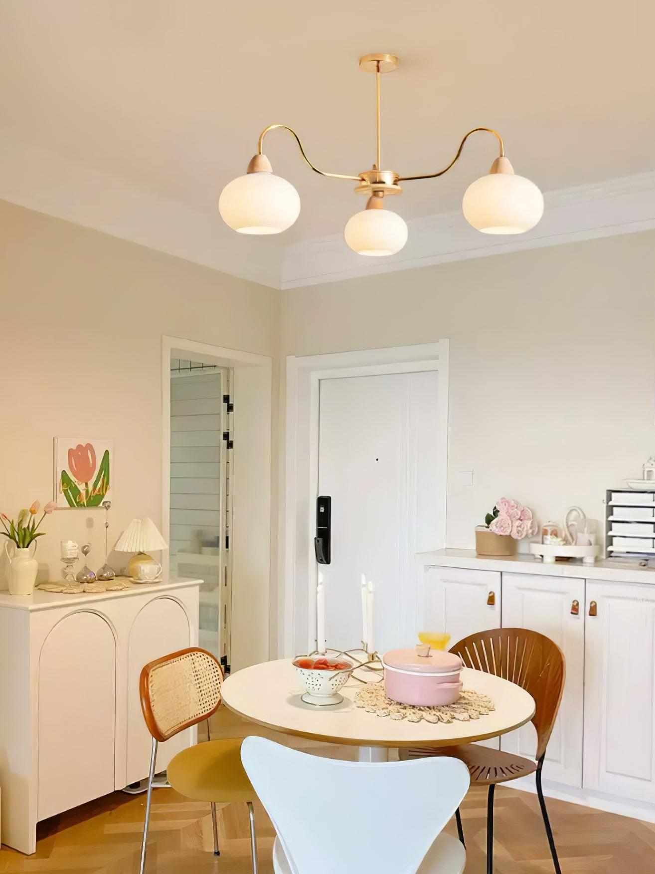 Elegant Glass Persimmon Chandelier with Adjustable Height & Warm Light