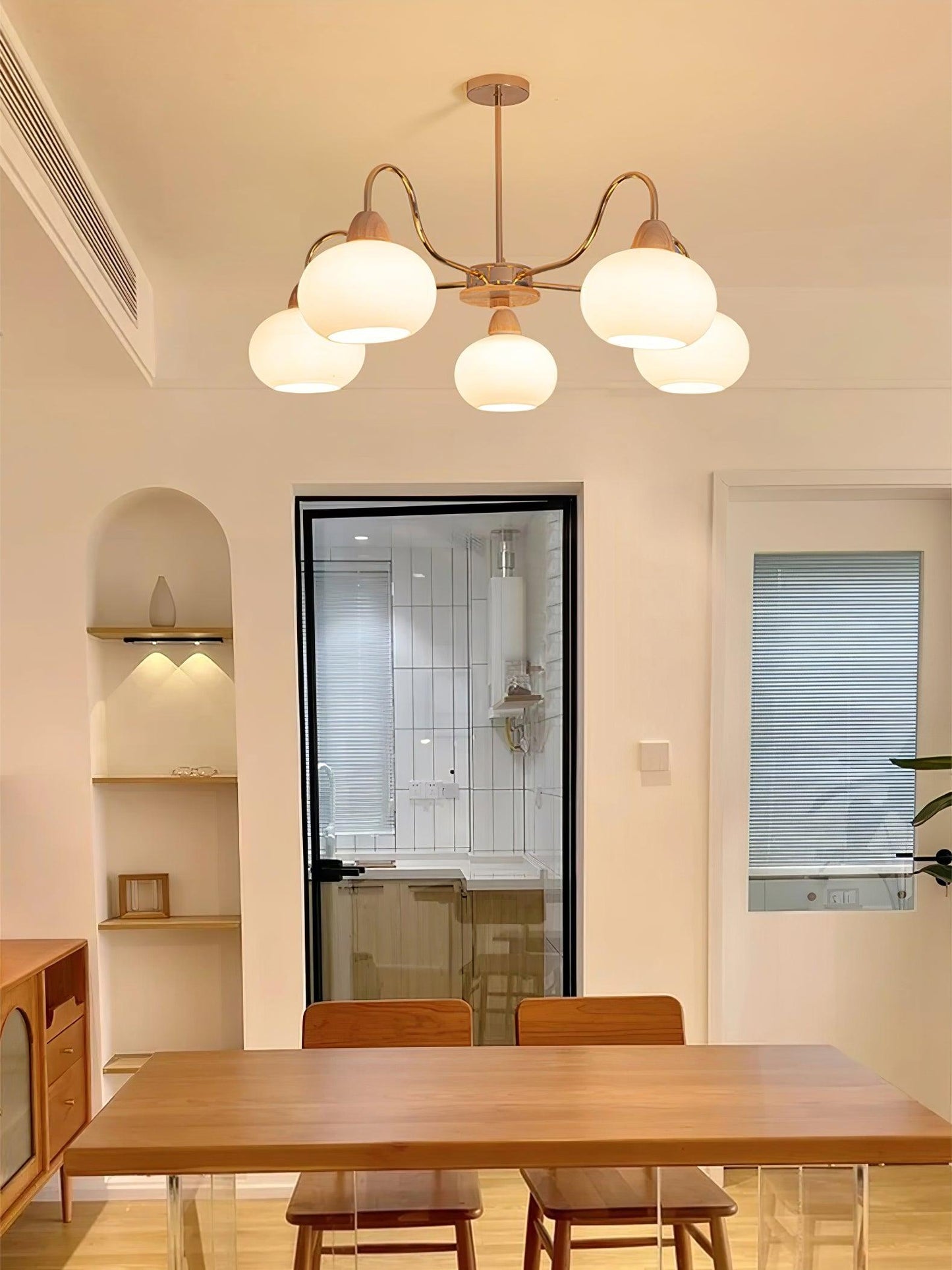 Elegant Glass Persimmon Chandelier with Adjustable Height & Warm Light