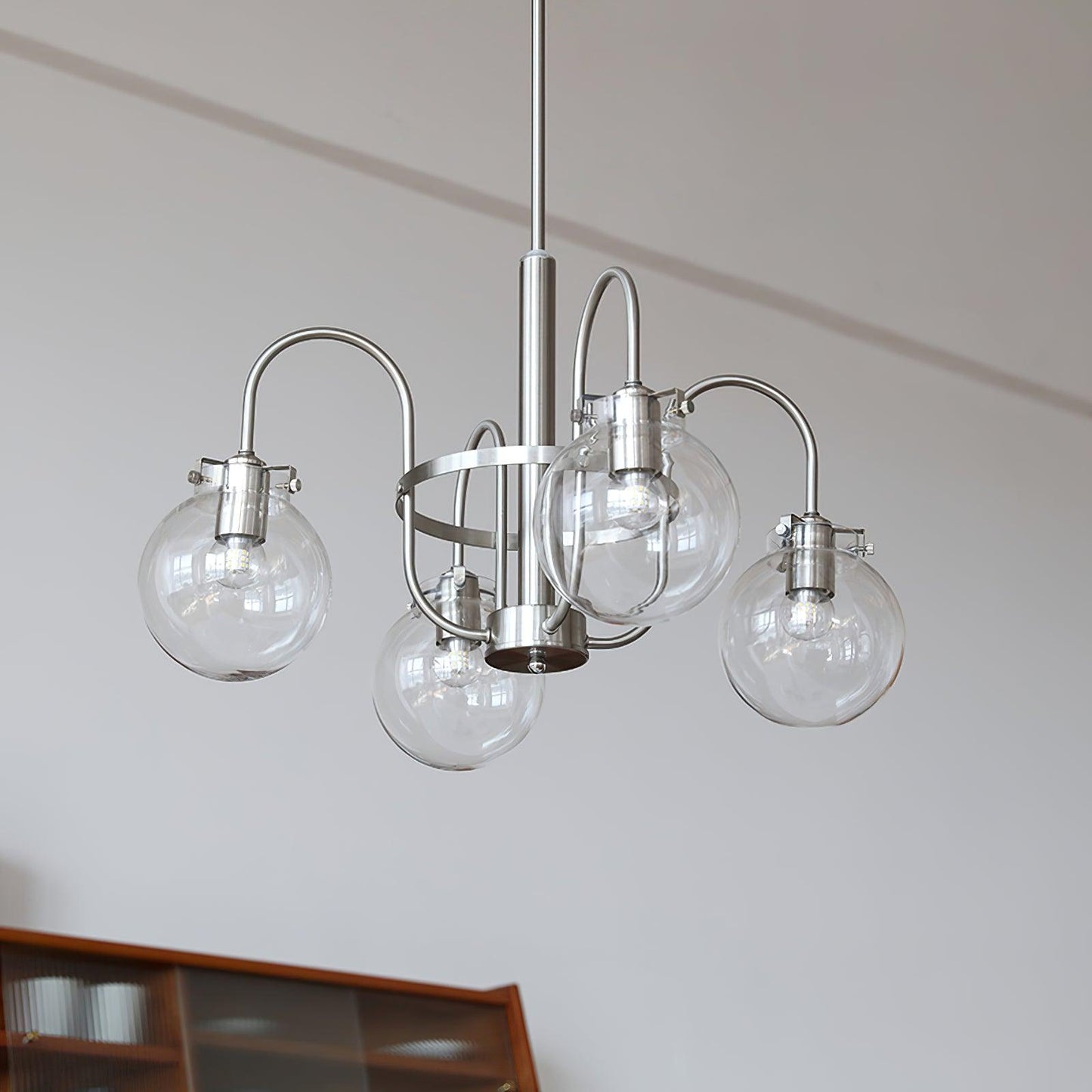 Elegant Hansford Chandelier with Adjustable Arms and Crystal Accents