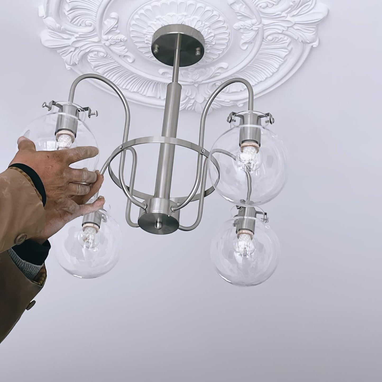 Elegant Hansford Chandelier with Adjustable Arms and Crystal Accents