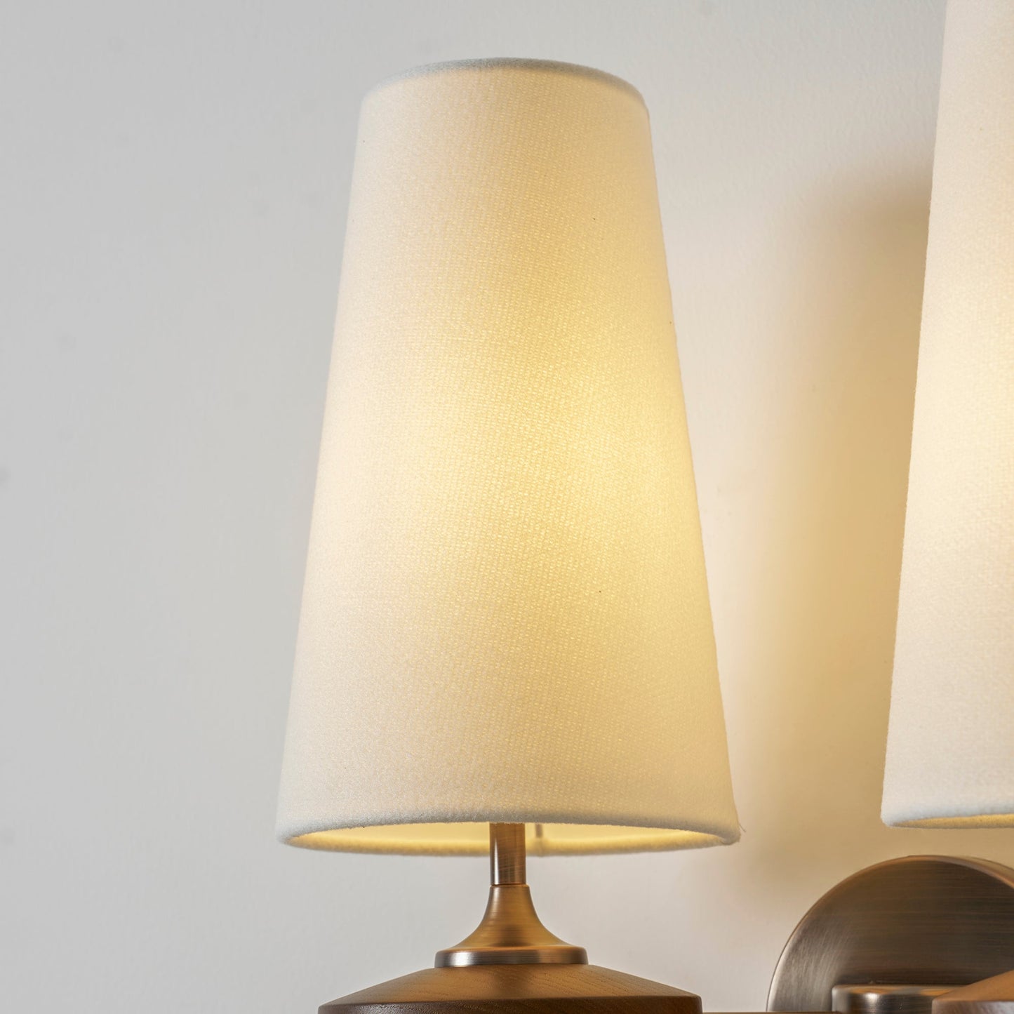 Orlan Twin Shade Wall Sconce - Adjustable Light Direction & Modern Des