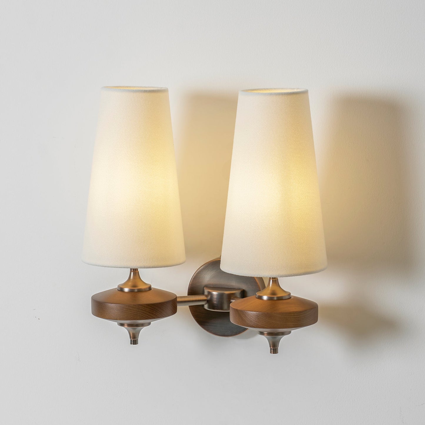 Orlan Twin Shade Wall Sconce - Adjustable Light Direction & Modern Des