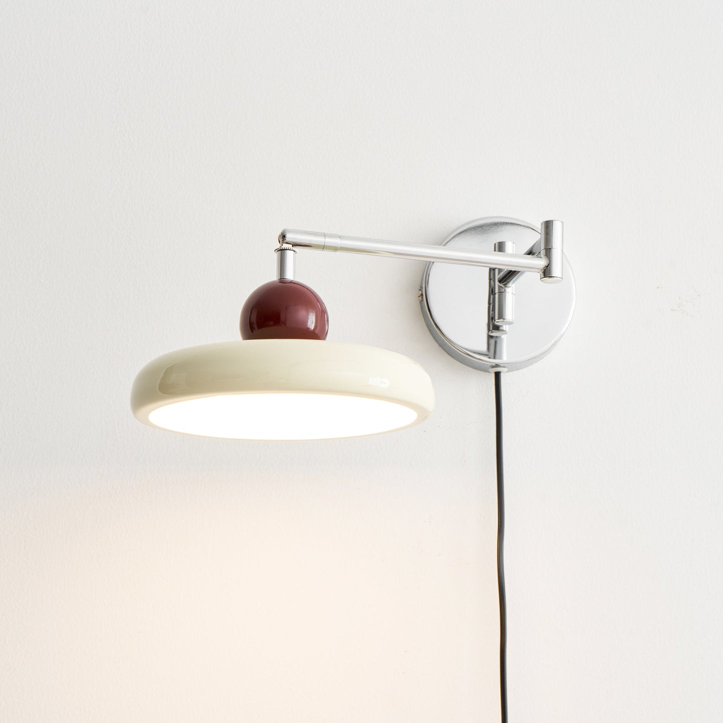 Lola Plug-in Wall Lamp - Adjustable Brightness & Elegant Design