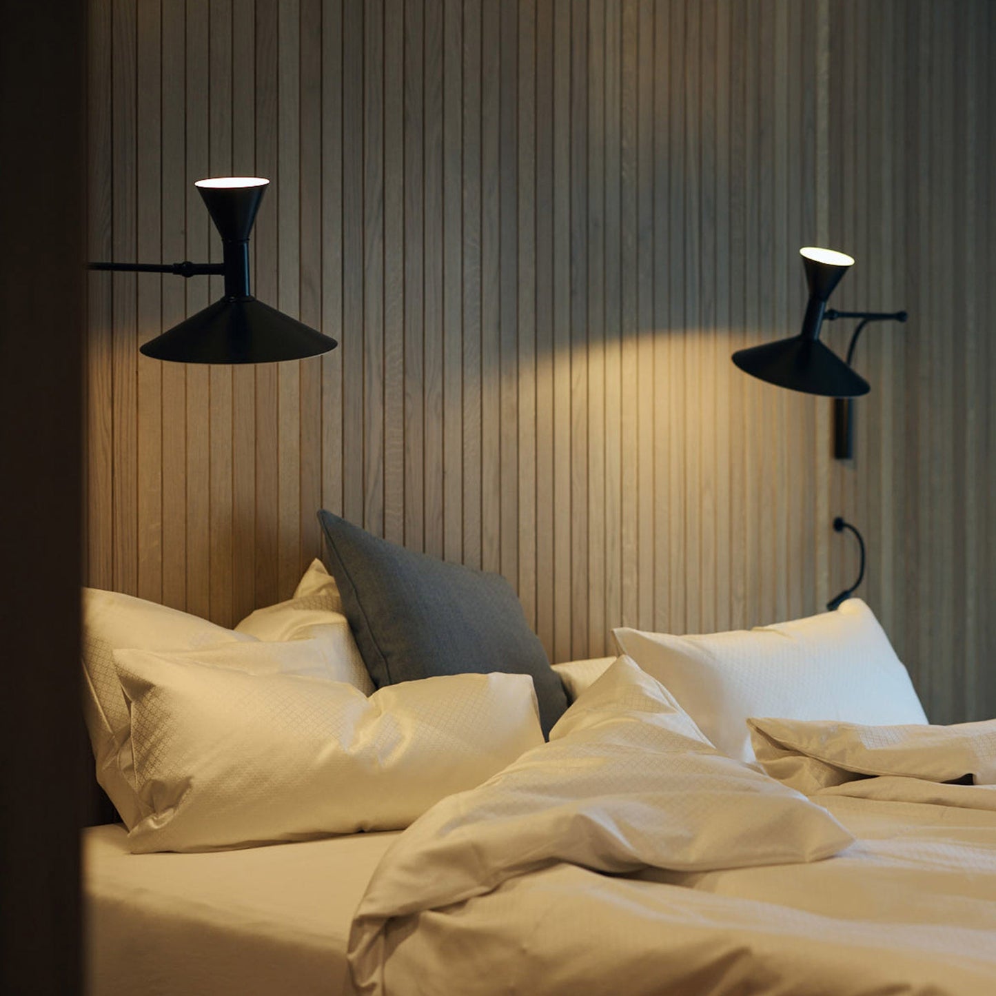 Marseille Plug-in Wall Light with Adjustable Brightness & Sleek Design