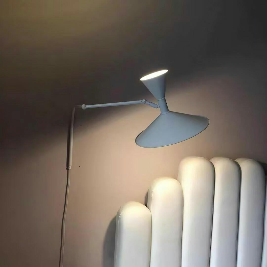 Marseille Plug-in Wall Light with Adjustable Brightness & Sleek Design