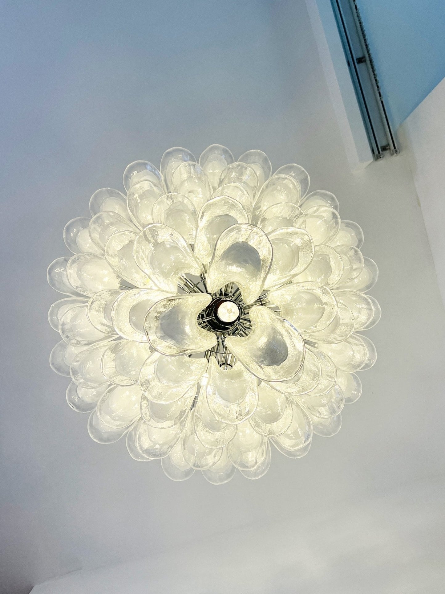 Elegant White Glass Petals Chandelier with Adjustable Height & Soft Il