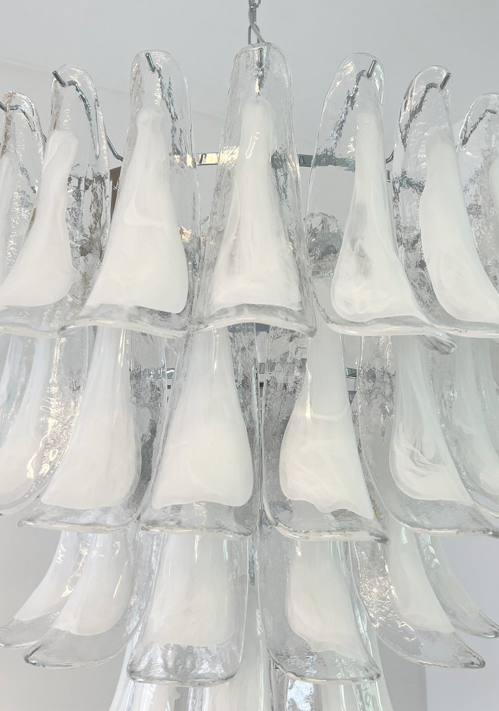 Elegant White Glass Petals Chandelier with Adjustable Height & Soft Il