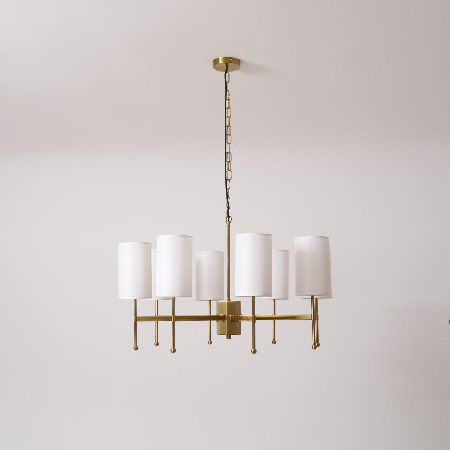 Brass Chandelier with Adjustable Height and Elegant Crystal Accents