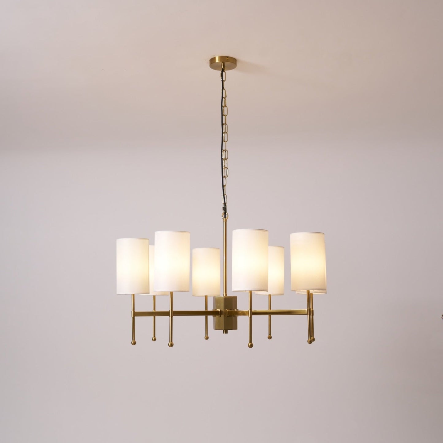 Brass Chandelier with Adjustable Height and Elegant Crystal Accents