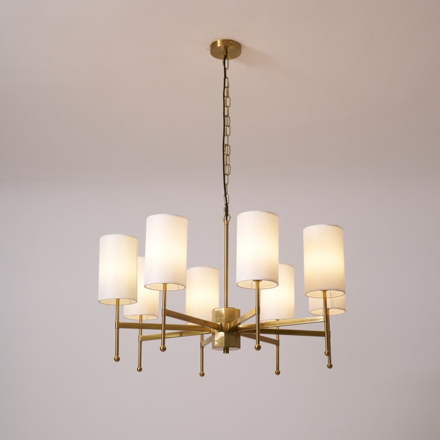 Brass Chandelier with Adjustable Height and Elegant Crystal Accents