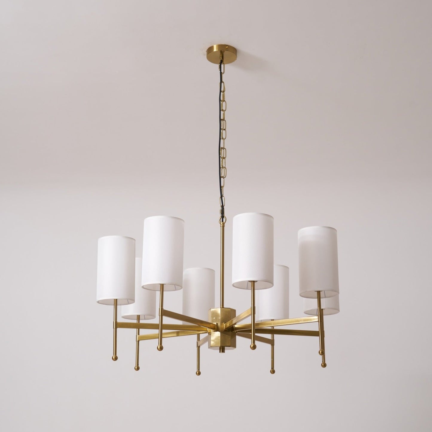 Brass Chandelier with Adjustable Height and Elegant Crystal Accents