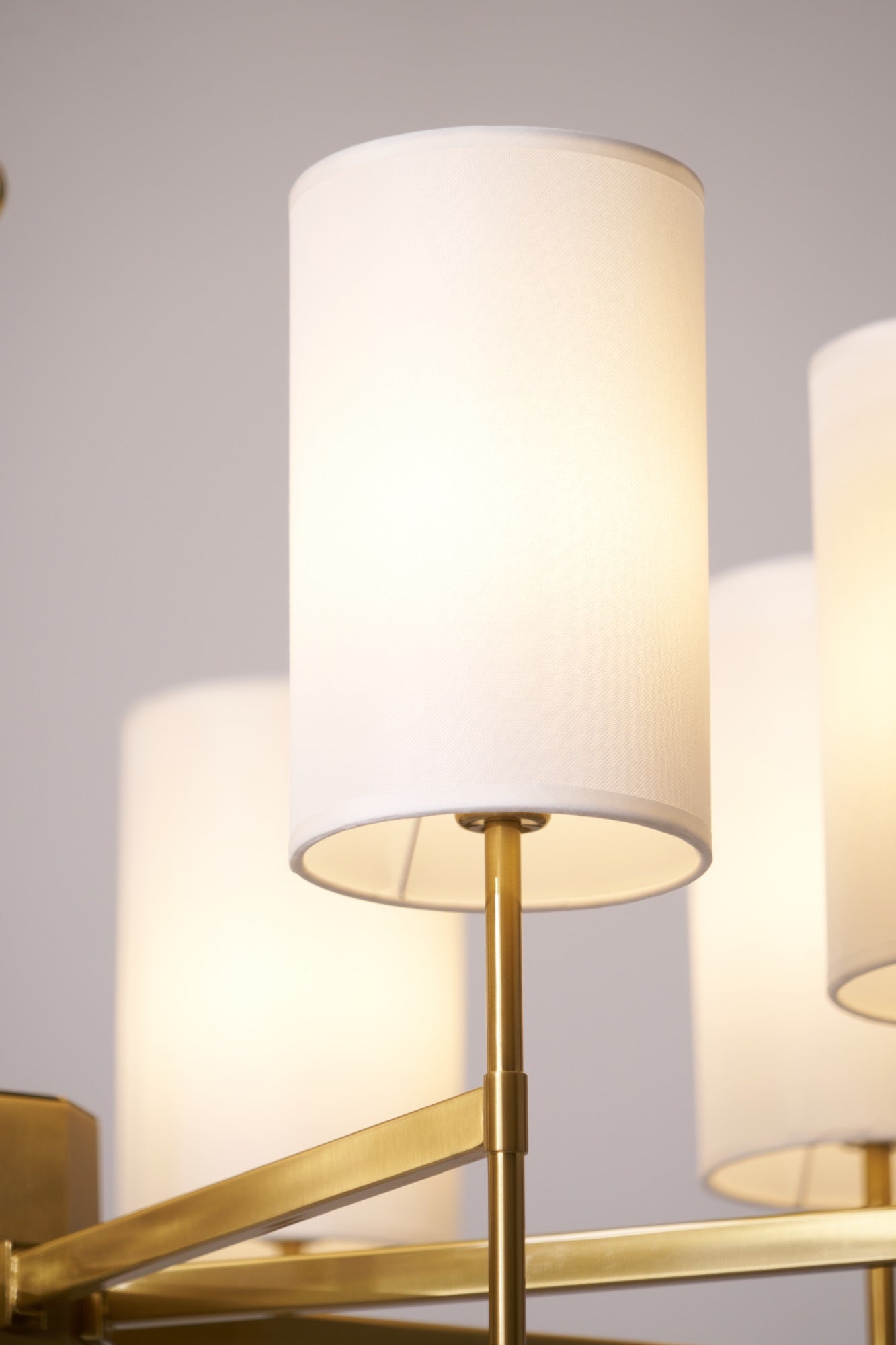 Brass Chandelier with Adjustable Height and Elegant Crystal Accents