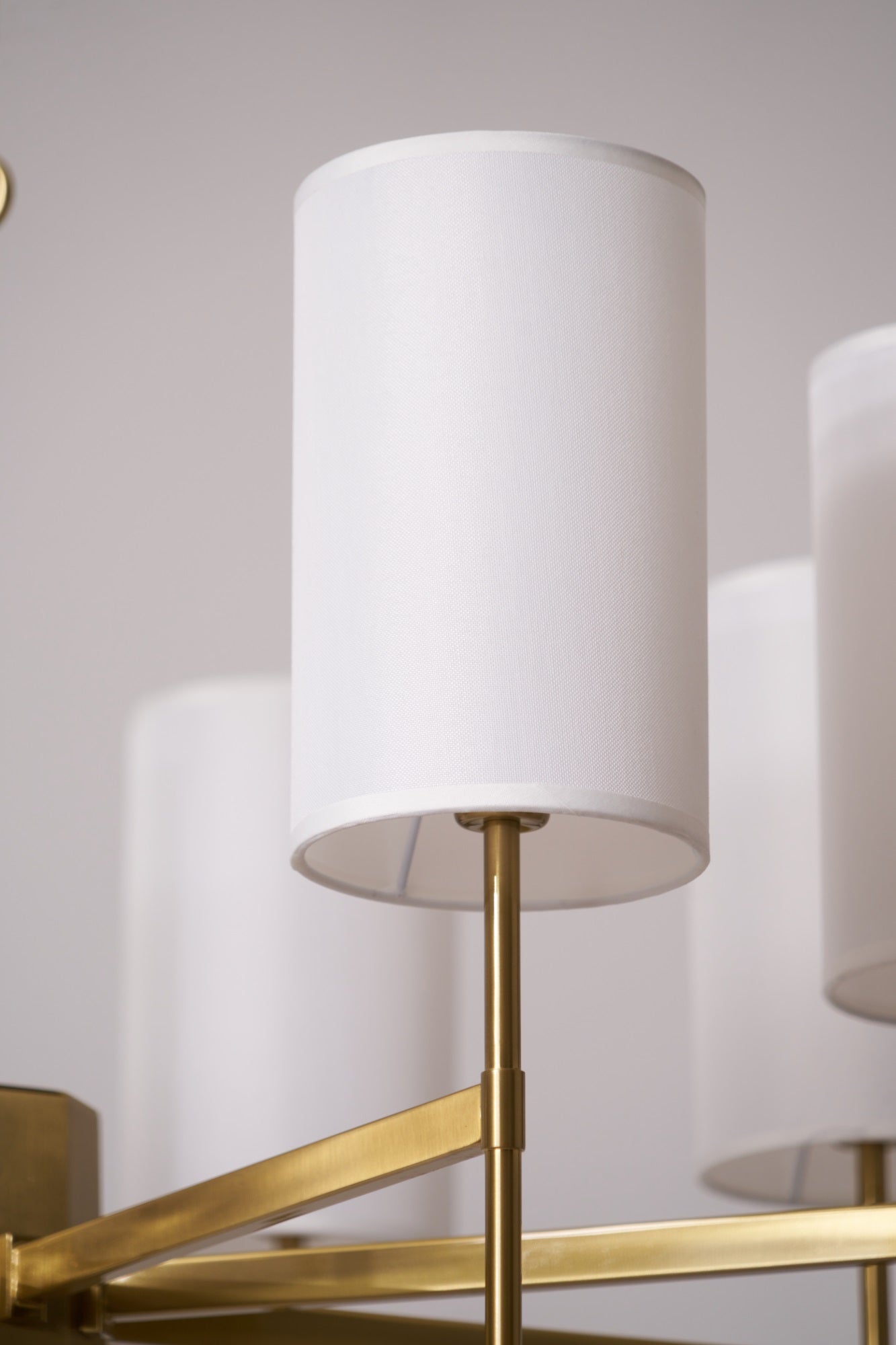 Brass Chandelier with Adjustable Height and Elegant Crystal Accents