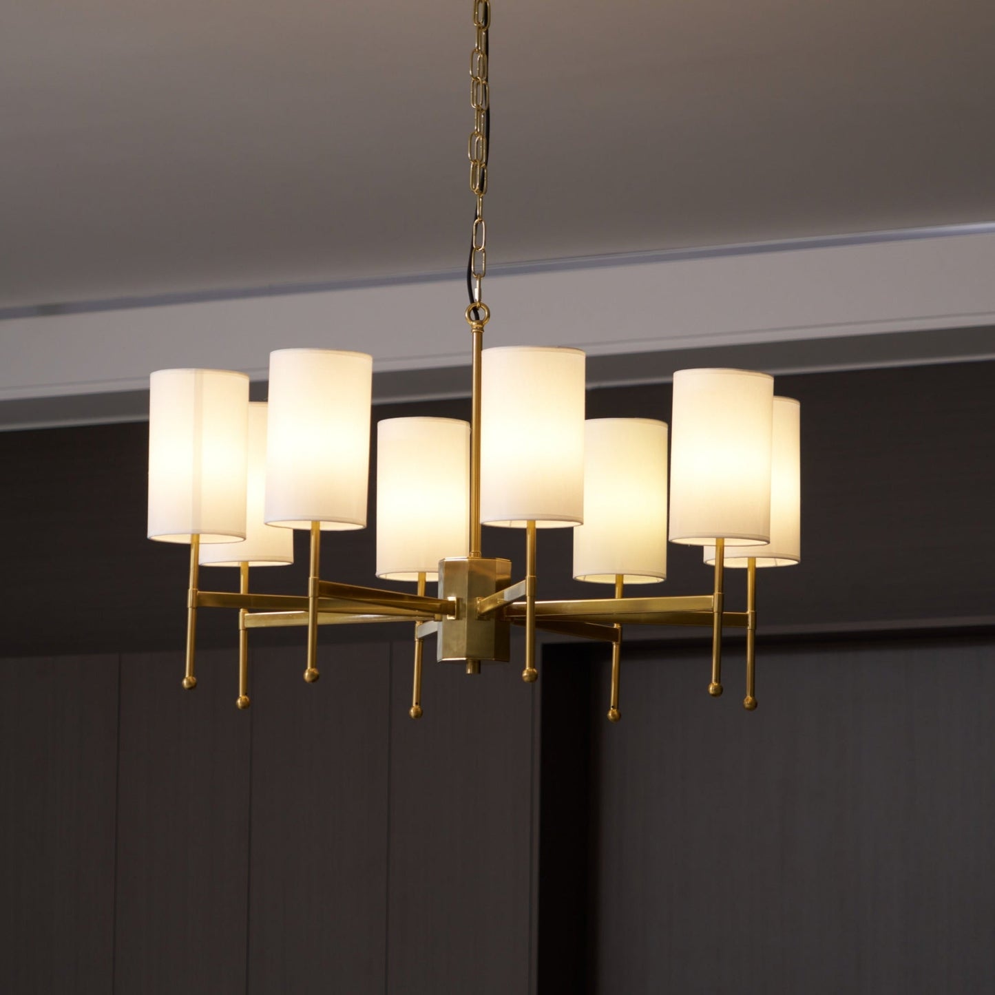 Brass Chandelier with Adjustable Height and Elegant Crystal Accents