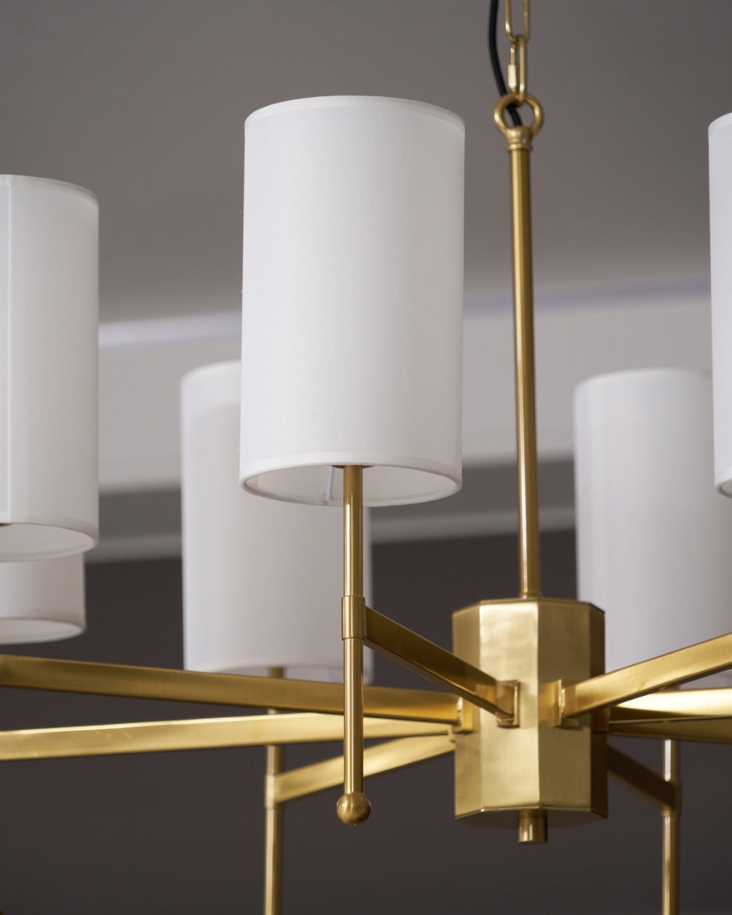 Brass Chandelier with Adjustable Height and Elegant Crystal Accents
