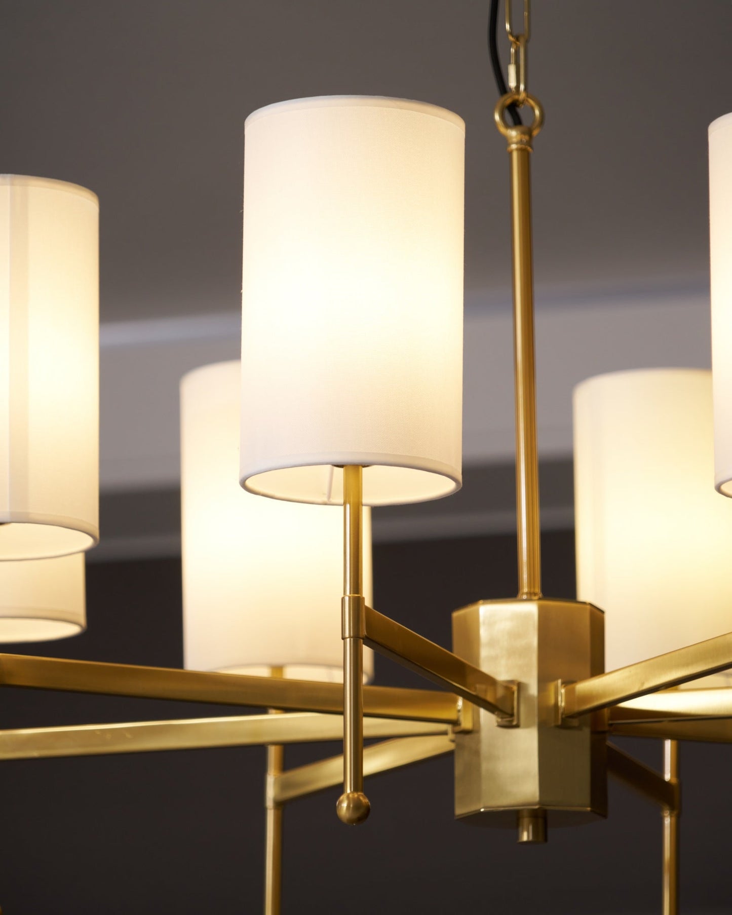 Brass Chandelier with Adjustable Height and Elegant Crystal Accents
