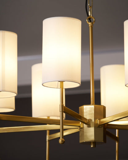 Brass Chandelier with Adjustable Height and Elegant Crystal Accents
