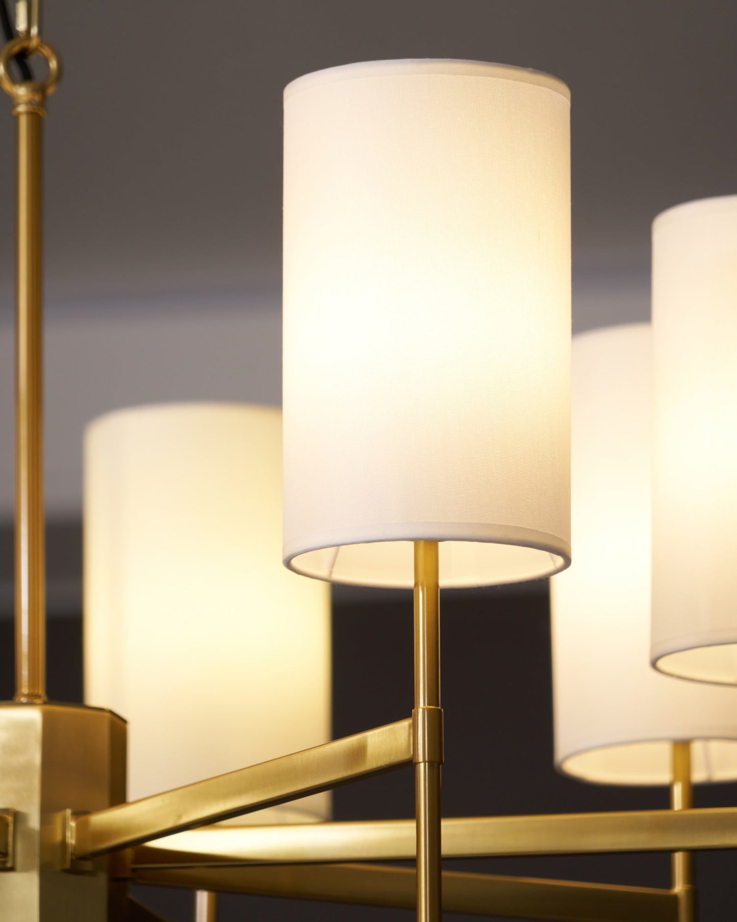Brass Chandelier with Adjustable Height and Elegant Crystal Accents