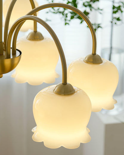 Elegant Brass Chandelier with Adjustable Arms and Crystal Accents