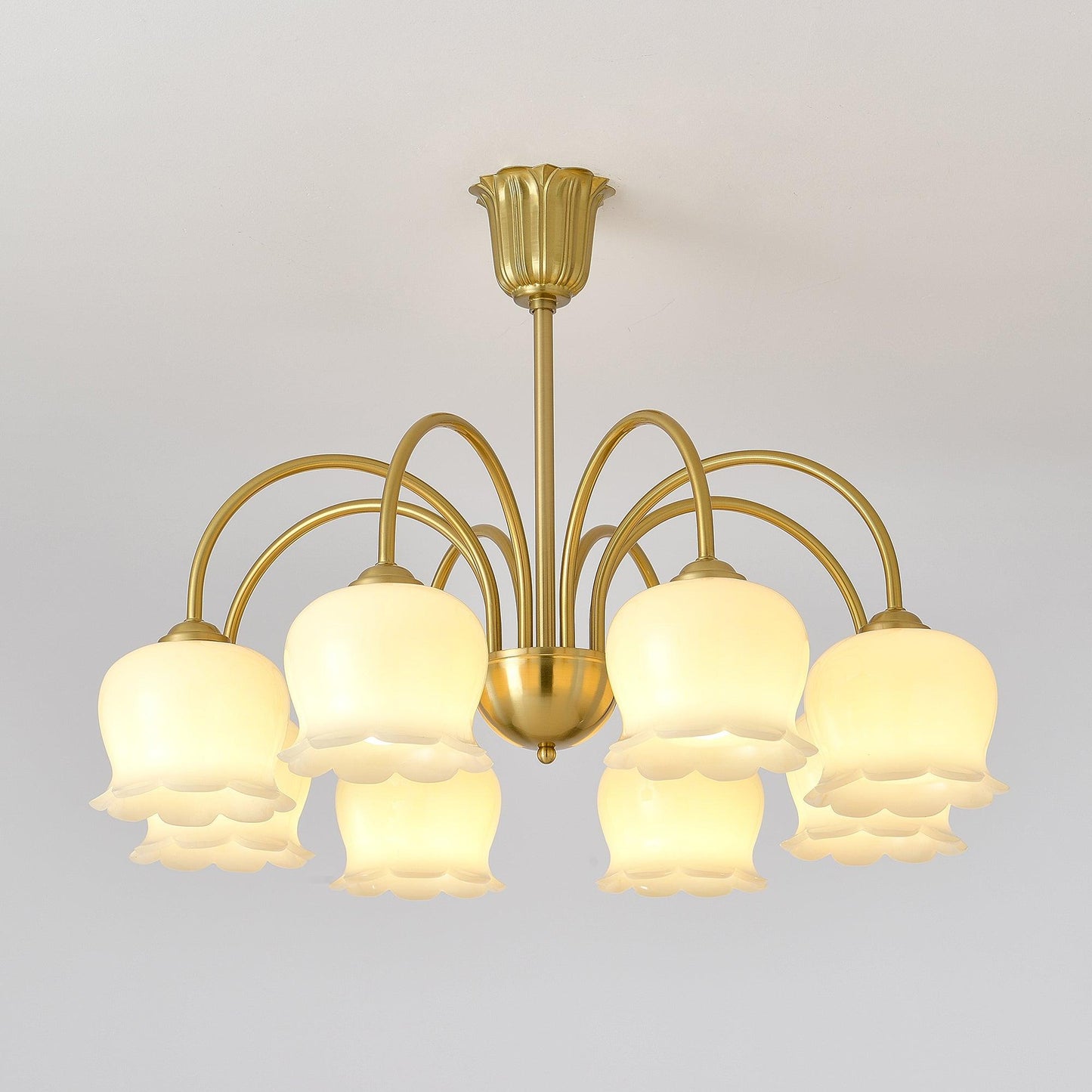Elegant Brass Chandelier with Adjustable Arms and Crystal Accents