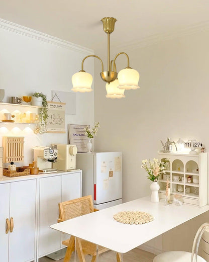 Elegant Brass Chandelier with Adjustable Arms and Crystal Accents