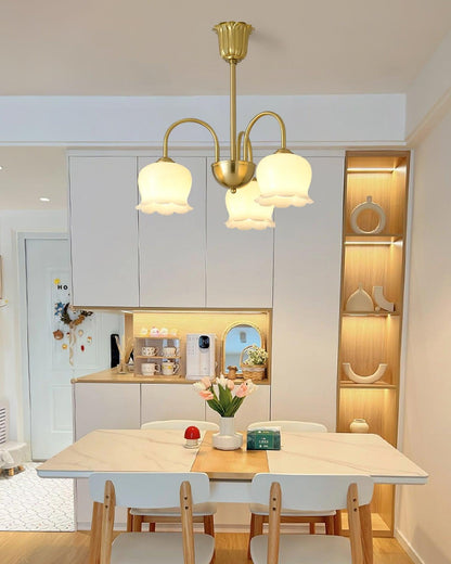 Elegant Brass Chandelier with Adjustable Arms and Crystal Accents