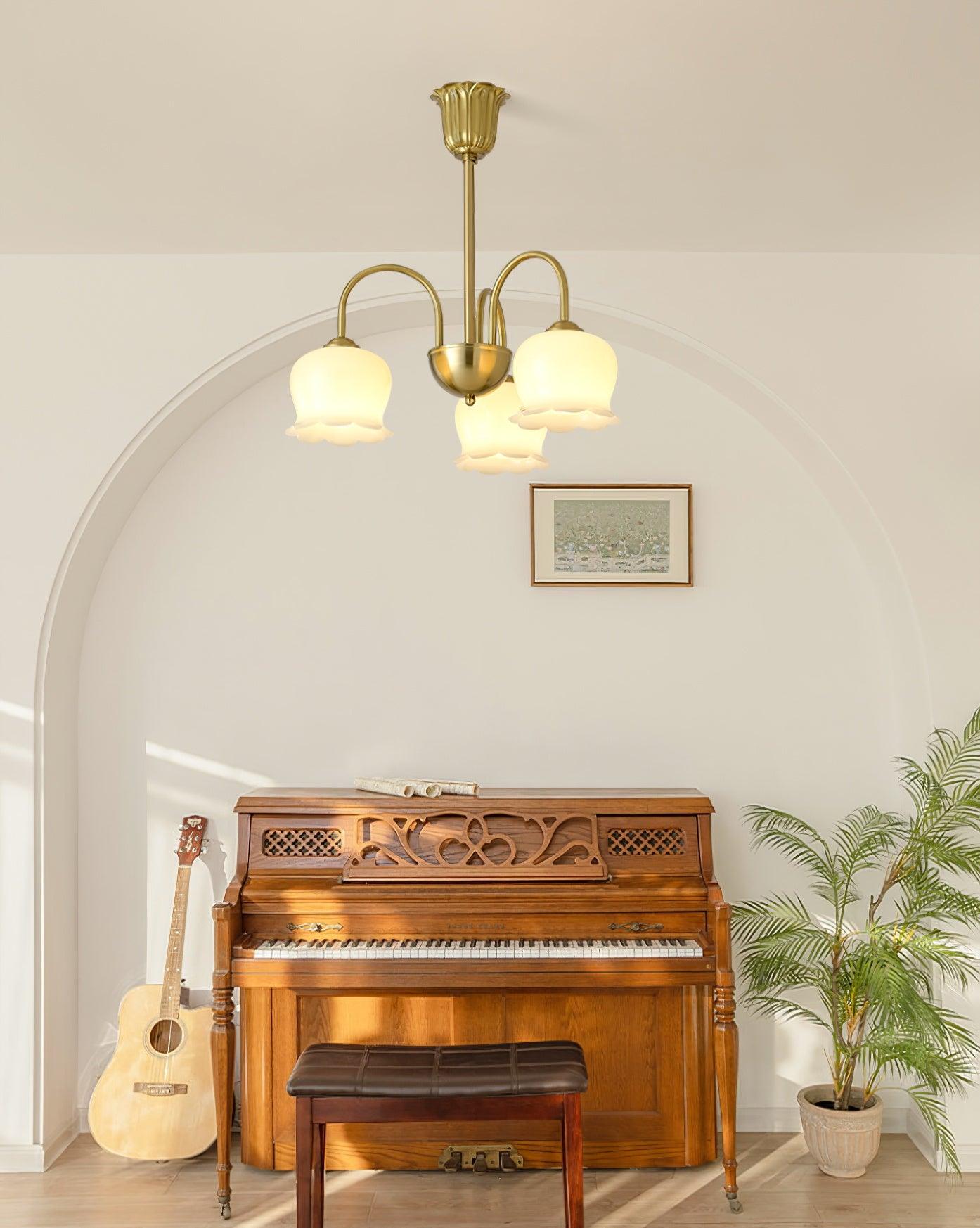 Elegant Brass Chandelier with Adjustable Arms and Crystal Accents