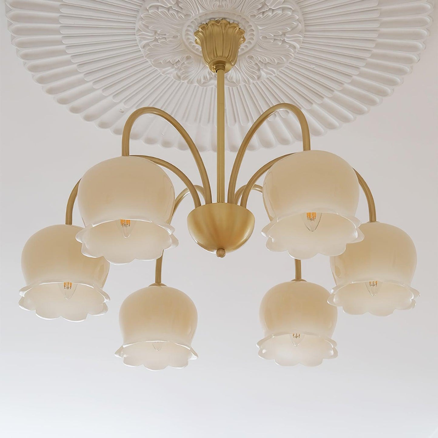 Elegant Brass Chandelier with Adjustable Arms and Crystal Accents