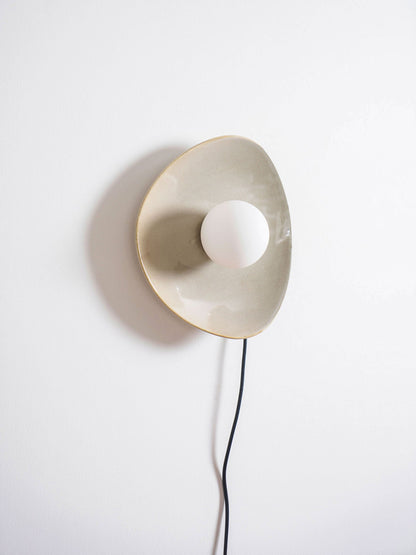 Pebble Disc Plug-in Wall Light with Adjustable Brightness & Energy Eff