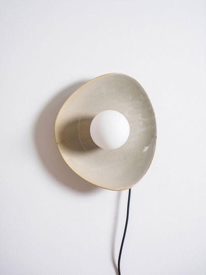 Pebble Disc Plug-in Wall Light with Adjustable Brightness & Energy Eff