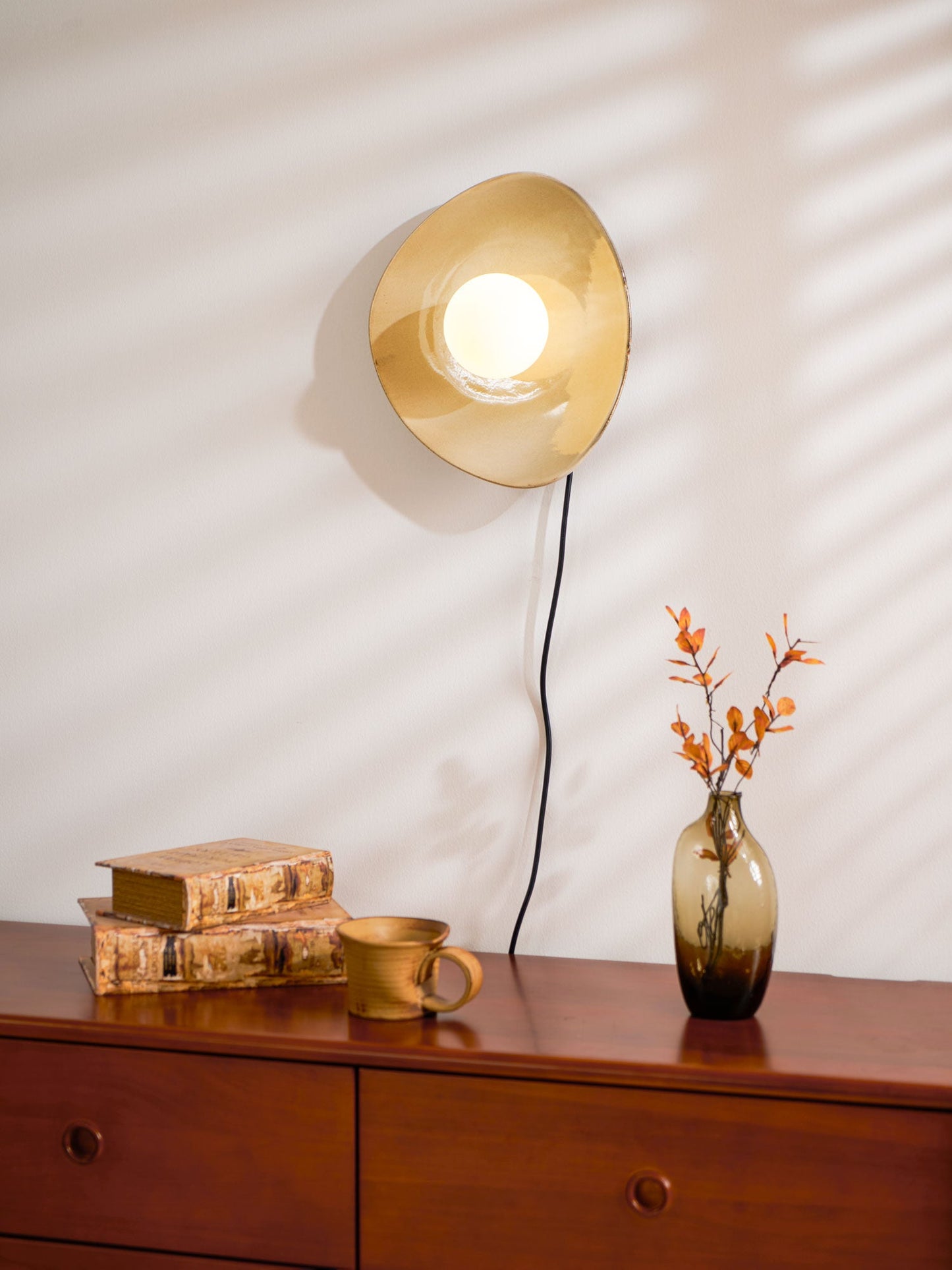 Pebble Disc Plug-in Wall Light with Adjustable Brightness & Energy Eff