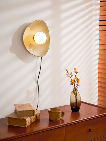 Pebble Disc Plug-in Wall Light with Adjustable Brightness & Energy Eff